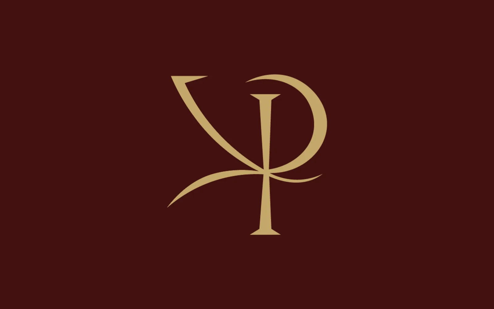 The Veelion's VP monogram in champagne gold on burgundy